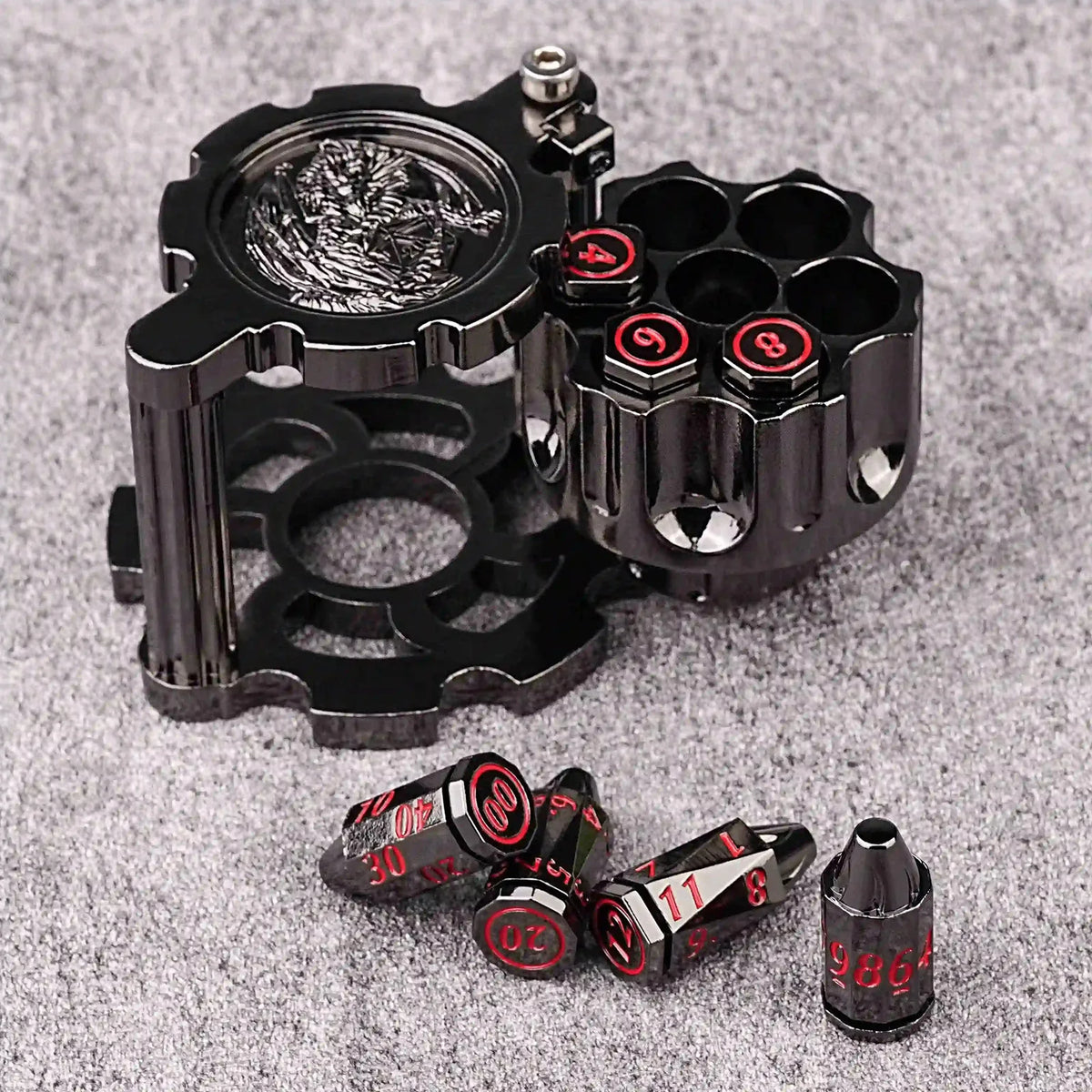 A set of revolver-shaped metal dice for RPG games, featuring various numbered dice and a metal holder.