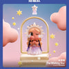 A collectible figurine of a crying star with a crown and flowing hair, displayed in a golden frame.