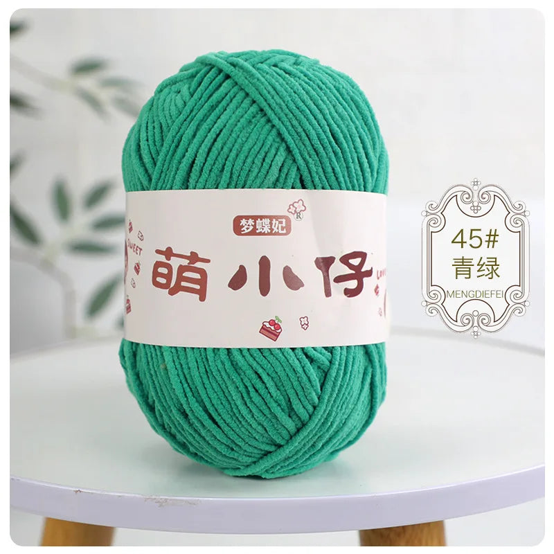 A ball of bright green chenille yarn with Chinese characters for knitting and crochet