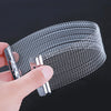 A hand holds a bundle of metal snare drum wire strands for cajon and snare drums.