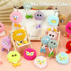Assorted plush animal keychains in various colors like pink, yellow, blue, and purple displayed on a white background.