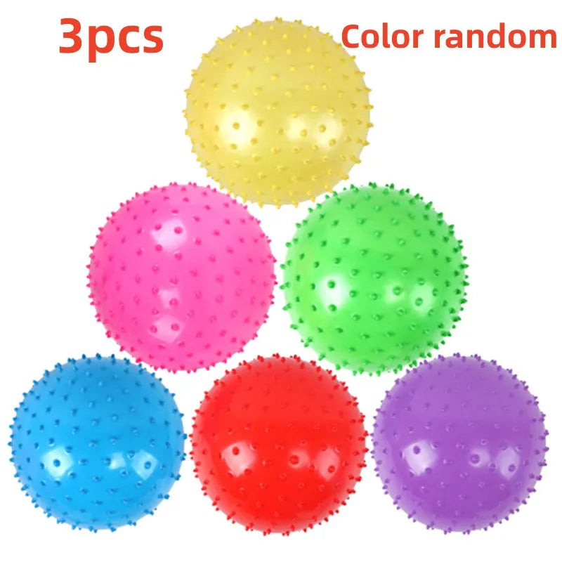 A set of three colorful inflatable sensory balls for kids, including yellow, pink, green, red, and purple.