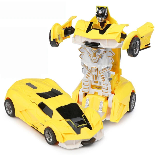 A yellow transforming car robot toy with silver armor and black accents, shown in a dynamic pose.