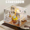 A wooden miniature dollhouse kit setup showing a study room interior with shelves, a desk, and a yellow chair.