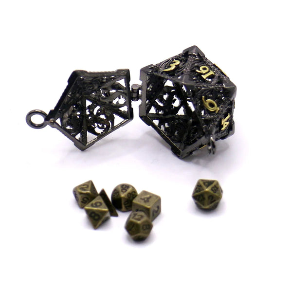 A set of dark gothic style metal dice, including a large dodecahedron and several smaller dice.