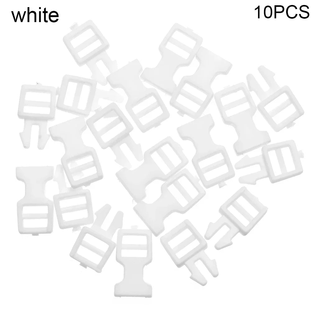 A collection of ten white mini plastic buckles for DIY crafts and outdoor gear.