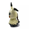 A soft collectible plush toy of Mimikyu, a Pokémon, with yellow and black features.
