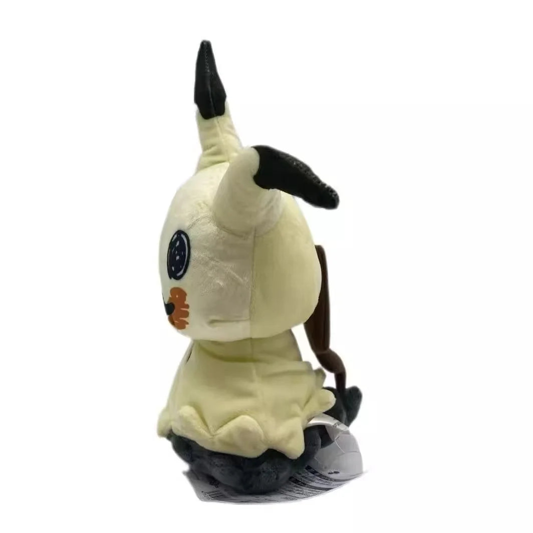 A soft collectible plush toy of Mimikyu, a Pokémon, with yellow and black features.