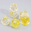 A set of clear, glitter polyhedral dice including D4, D6, D8, D10, D12, D20, and D00 dice scattered on a white surface.