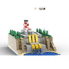 A LEGO construction kit depicting a rocky landscape with a tower and various terrain features.