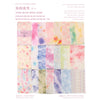 A collection of watercolor paper sheets featuring various floral and abstract color blends.