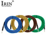 A collection of coiled professional instrument cables in blue, gold, brown, and green.