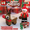 A brown reindeer toy figure with antlers and a red Santa hat is displayed against a Christmas background.