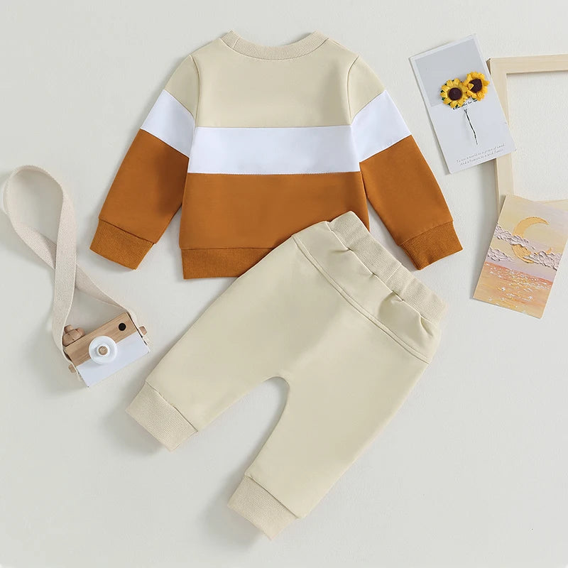 Toddler boys color block sweatshirt and pants set featuring mustard yellow, white, and burnt orange tones.