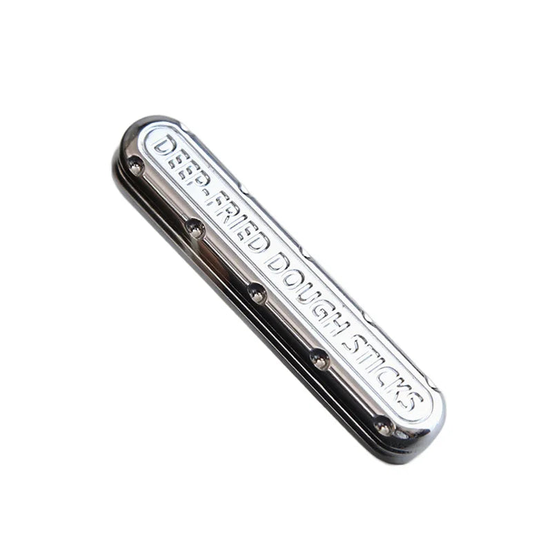 A silver metal fidget slider designed for stress relief and anxiety.