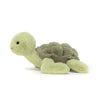 A soft, light green simulated turtle plush doll with textured skin and flippers.