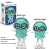 A pair of green jellyfish toys with light and music, shown packaged and disassembled.
