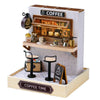 A wooden miniature dollhouse kit featuring a brick coffee shop facade with an open display and counter.