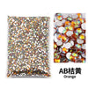 Bag of orange flat-back resin rhinestones for DIY craft and nail art