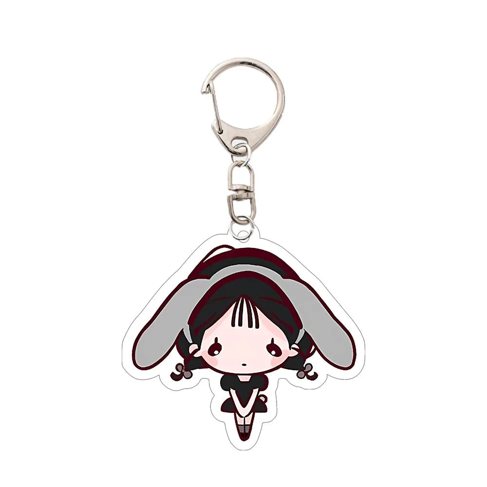Acrylic keychain featuring a chibi anime character with black hair and a gray headband.