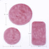 A pink handwoven miniature carpet mat with a round and rectangular shape for dollhouse decor