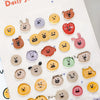 A collection of various 3D smile face crystal stickers in different colors and shapes for crafting
