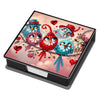 A leather diamond painting kit box featuring colorful birds and hearts on a pink background.