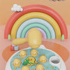 A yellow wooden hammer toy shaped like an animal is displayed in front of a colorful rainbow background.