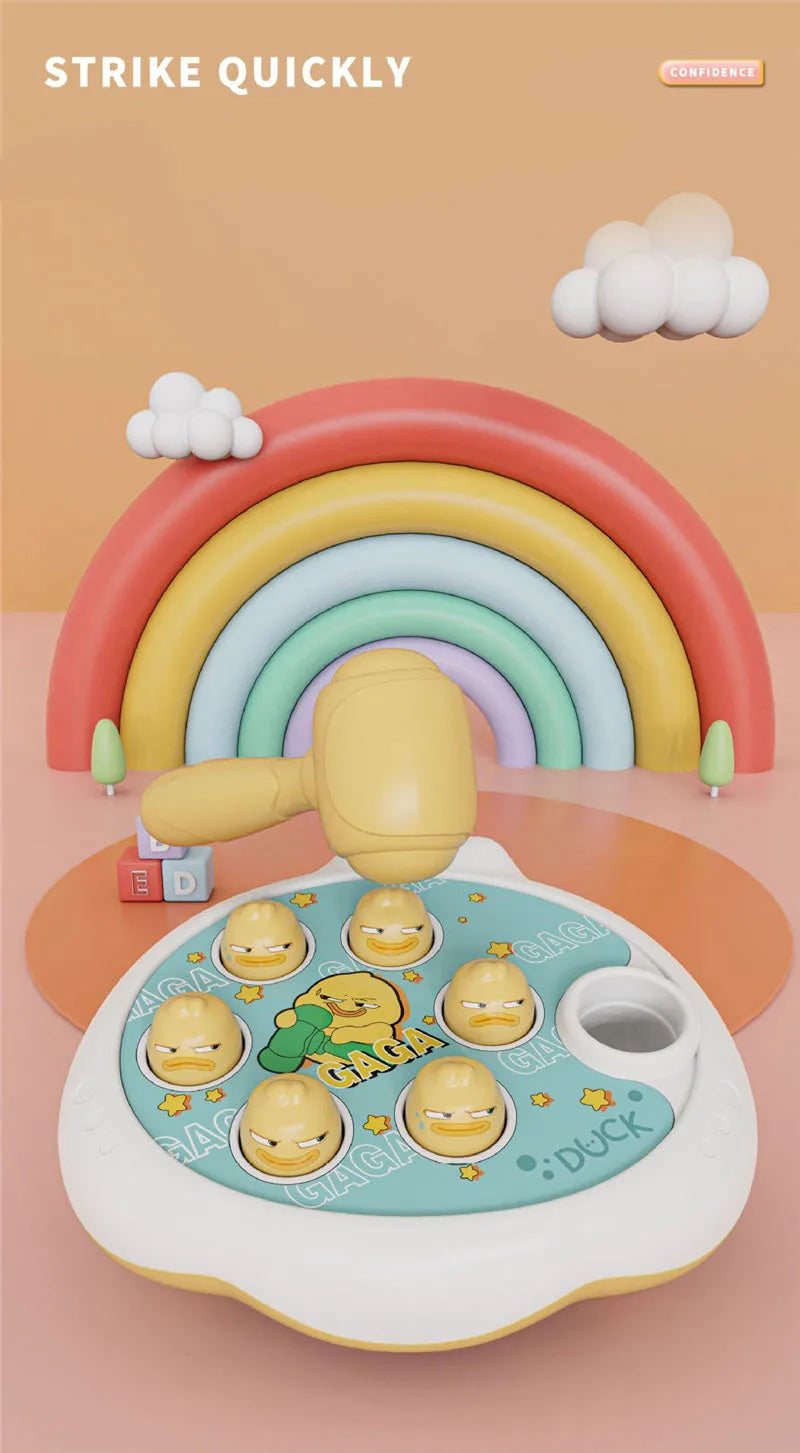 A yellow wooden hammer toy shaped like an animal is displayed in front of a colorful rainbow background.