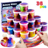 A hand is stretching a colorful, iridescent slime from a purple container, with many small containers of Galaxy Slime party f