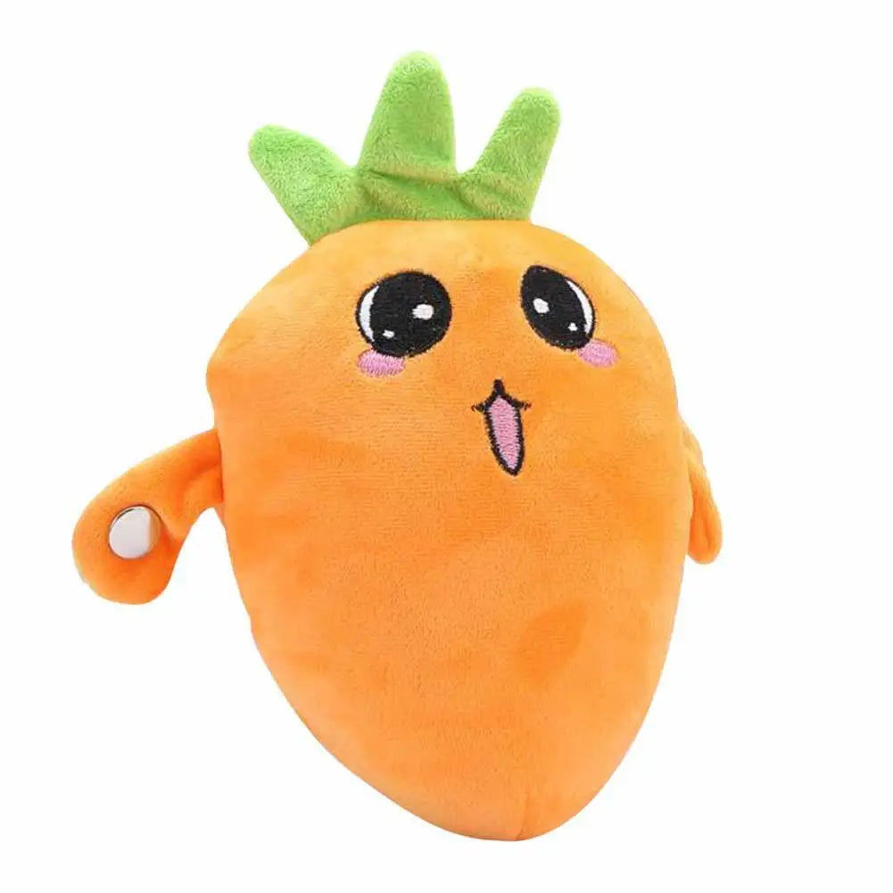 An orange plush toy shaped like a carrot with green leafy top and cute facial features.