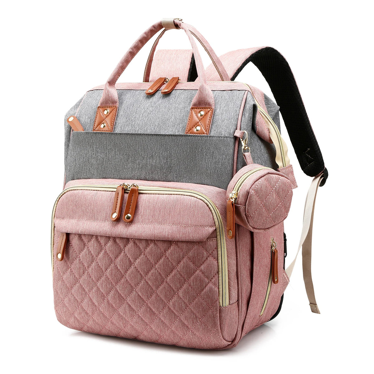 Sac à langer tout-en-un rose et gris avec station de changement intégrée et bretelles rembourrées.