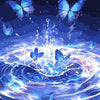 Blue butterflies flying above a swirling blue paint effect on a canvas.