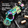 A metallic, iridescent toy pistol with a shell ejection mechanism and spin-to-relieve features is shown on a dark, textured s