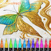 A set of dual-tip glitter brush markers featuring a metallic finish, displayed alongside a golden butterfly design.