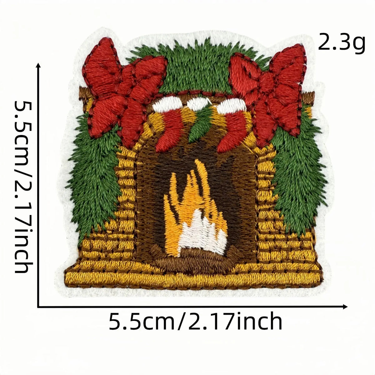 A hand-stitched embroidery patch depicting a festive scene with red bows, green foliage, and a yellow-lit fireplace.