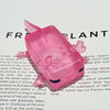 A pink squishy toy shaped like a jellyfish, used for sensory stress relief or fidgeting.