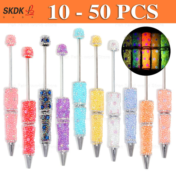 A collection of beaded ballpoint pens featuring various colors and rhinestone grips.