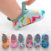 A collection of colorful baby barefoot water shoes for beach and outdoor play
