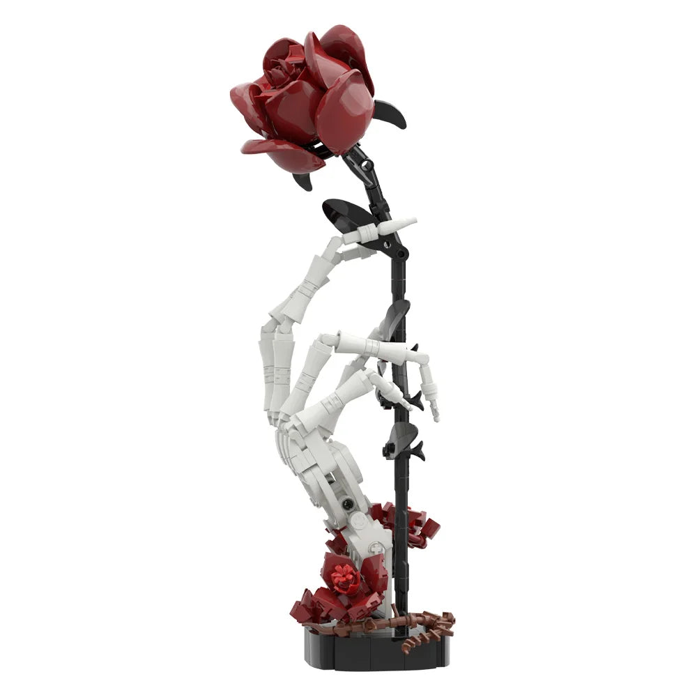 Skeleton hand figure holding a red rose bouquet building kit