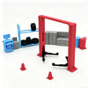 A red and black mini garage diorama display featuring tools and equipment.