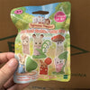 A package of Sylvanian Families Mini Forest Costume Baby Series figures featuring various animal characters.