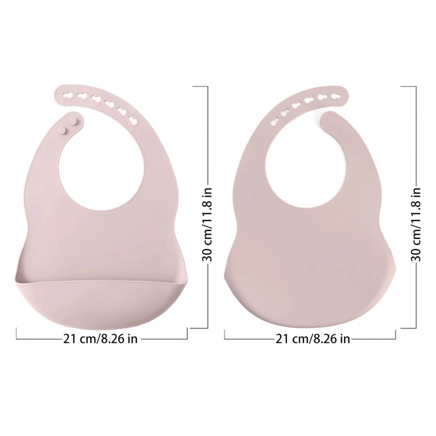 A pair of light pink waterproof silicone baby bibs with adjustable necks shown from the top and side.