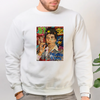 A white sweatshirt featuring a colorful heat transfer patch design of a man's face.