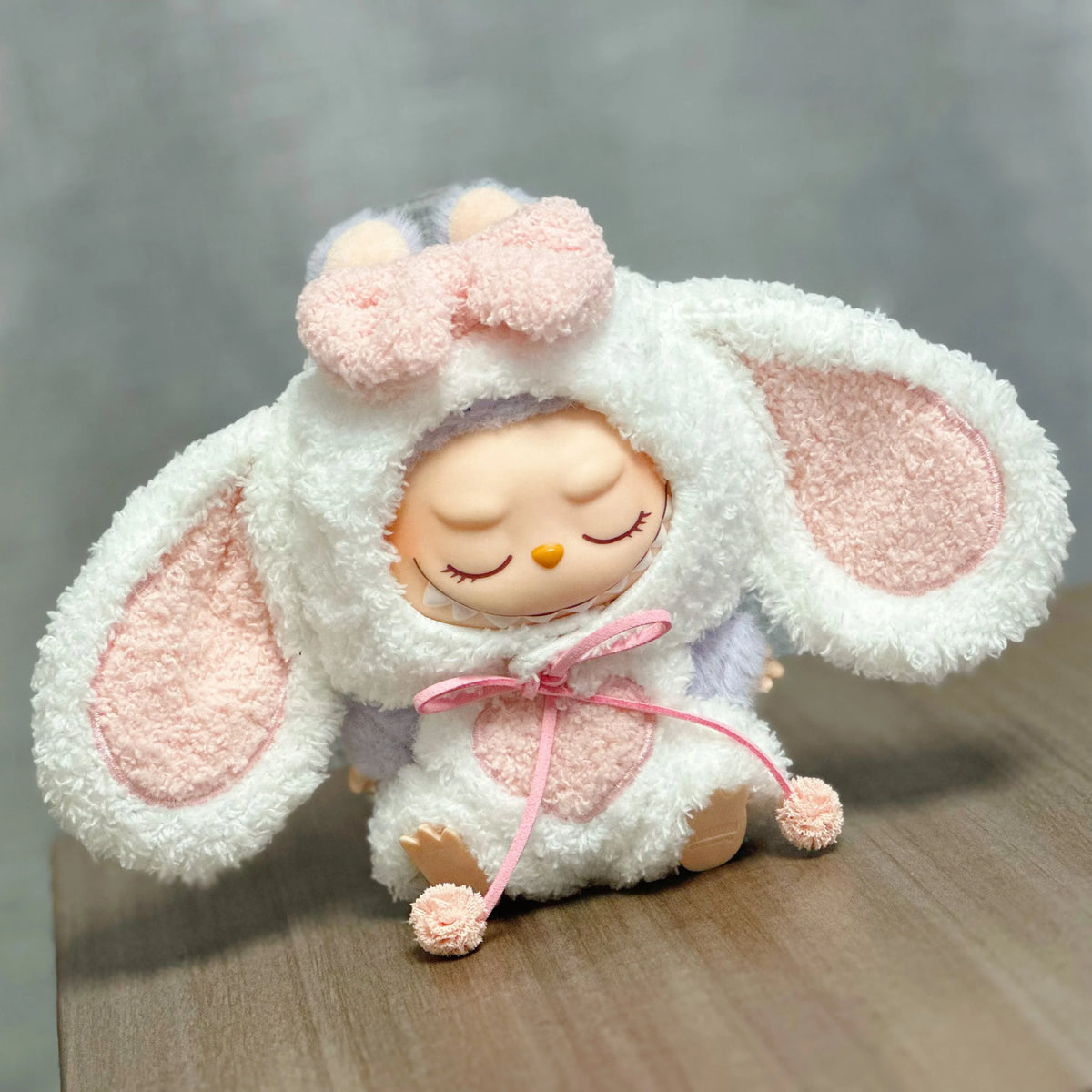 A white rabbit costume with pink accents and long ears, designed for 17cm Labubu dolls.