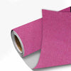 Rolls of magenta linen book binding cloth used for albums and scrapbooks