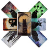 A spread of tarot cards featuring black cats and mystical imagery on a dark background.