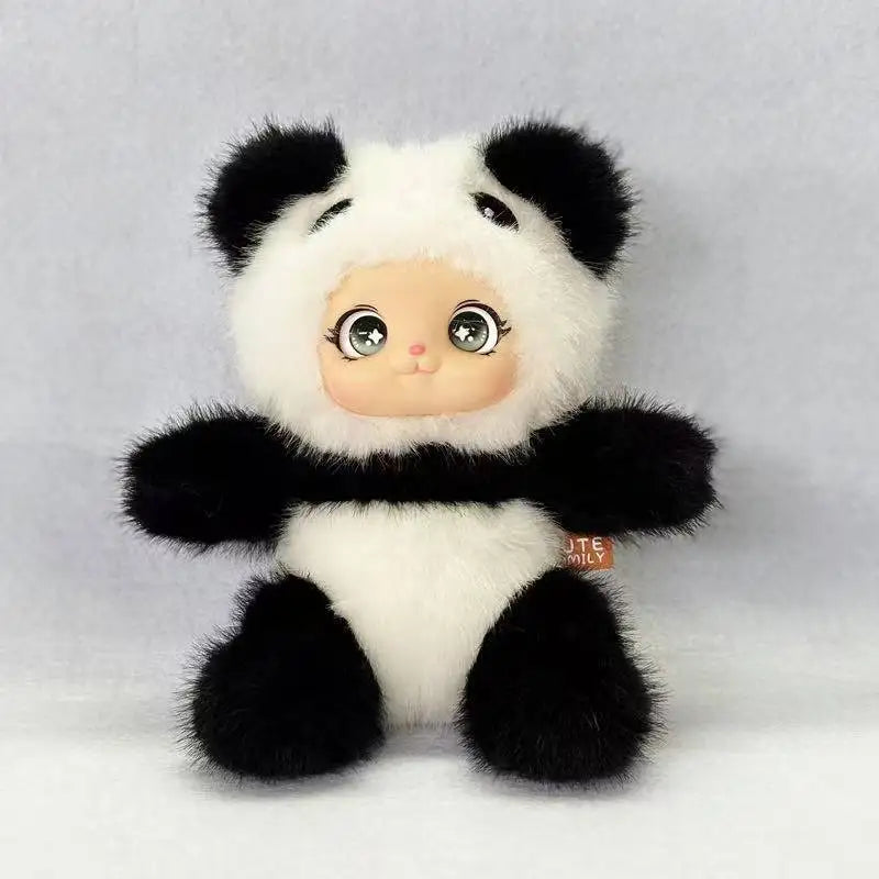 A plush pendant featuring a cute animal face design with black and white fur.