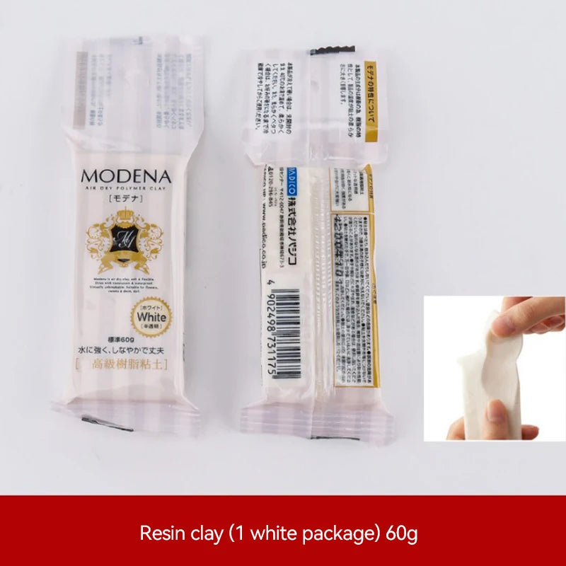 A package of white resin clay for sculpting and crafting is shown next to a plastic container.