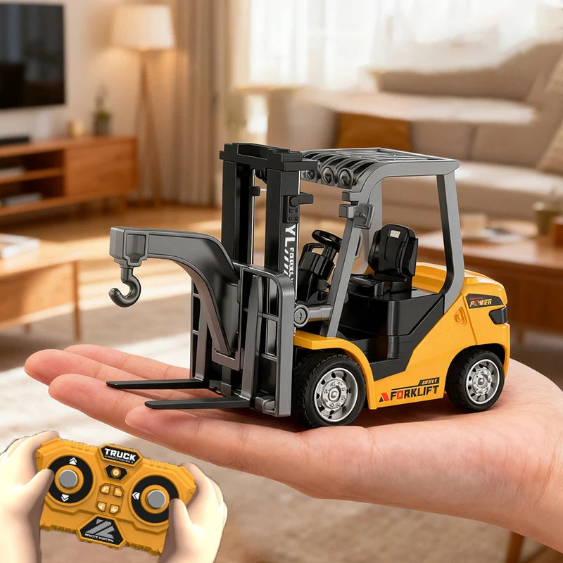 A yellow 1:64 scale remote control forklift excavator is held in a person's hand with a yellow controller nearby.